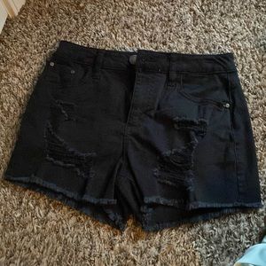 I’m selling these black denim shorts.